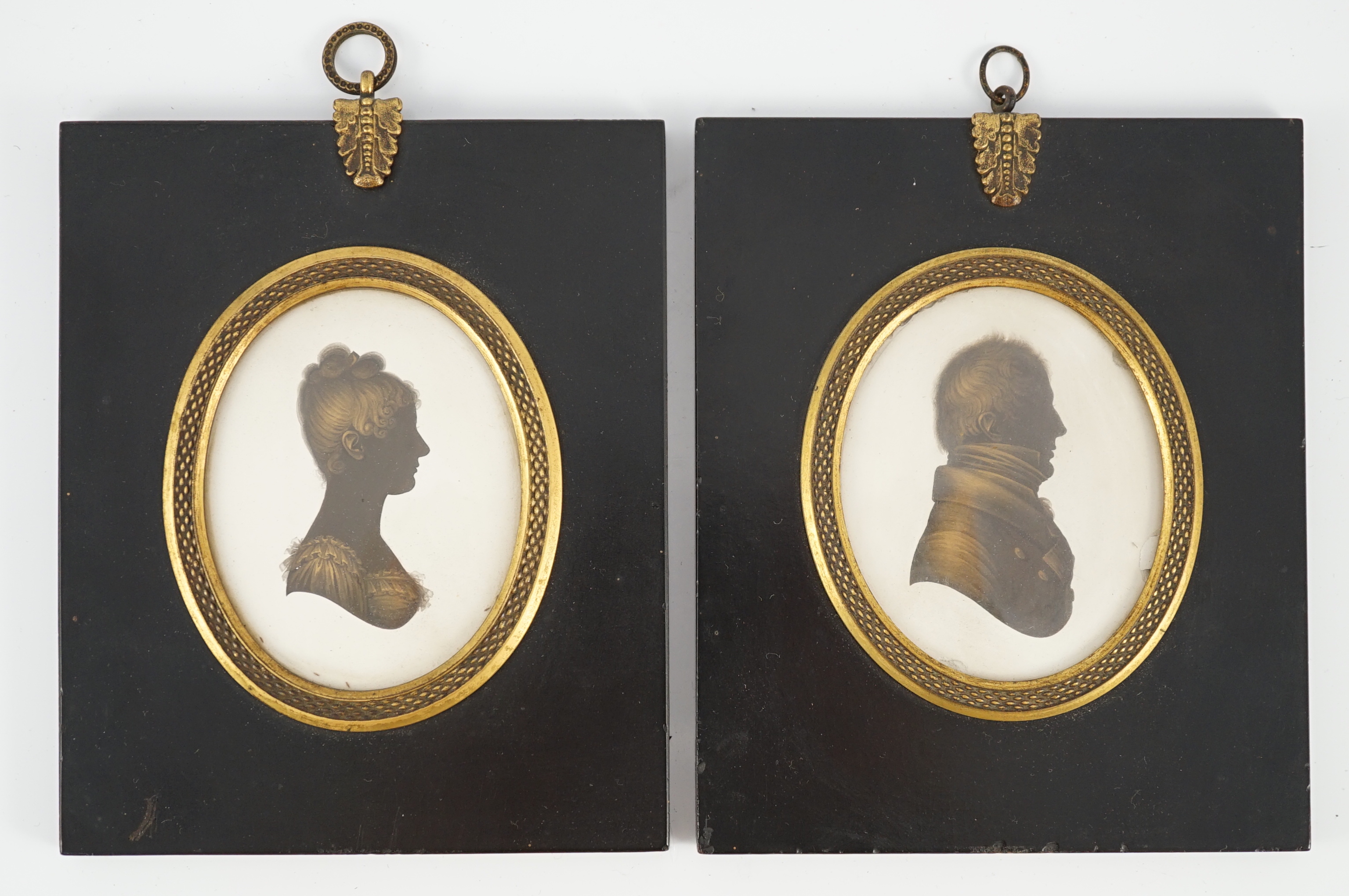 John Miers (1756-1821), Silhouettes of a lady and gentleman, painted and bronzed plaster (2), 8.1 x 6.3cm.